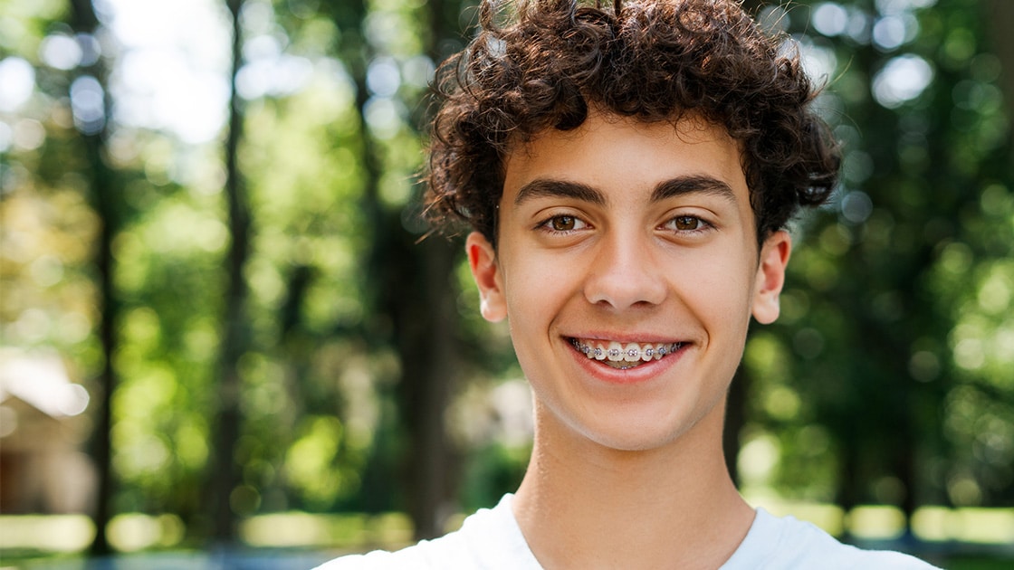 Teen in green shirt